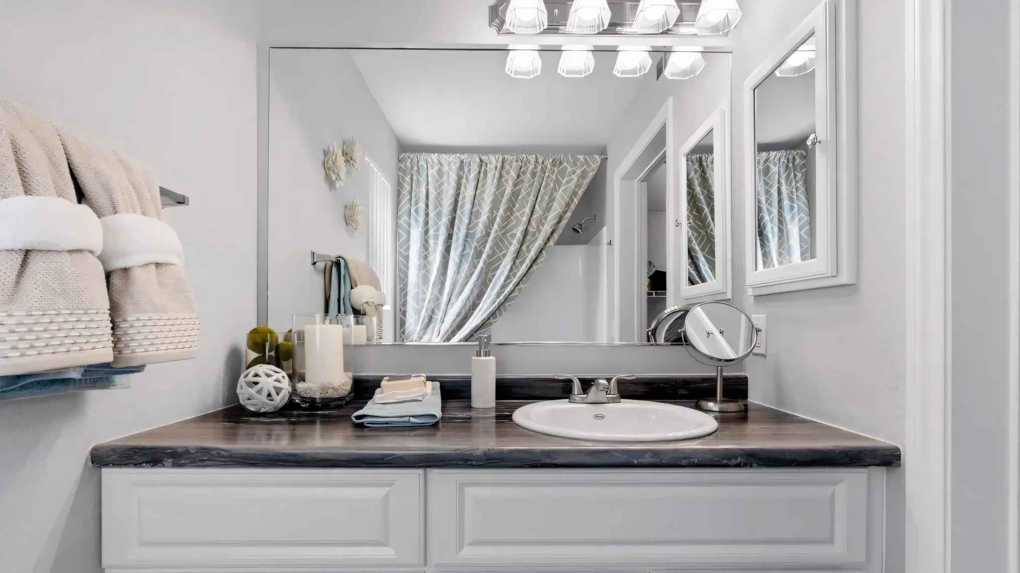 bathroom spacious sink mirror at Millennium East